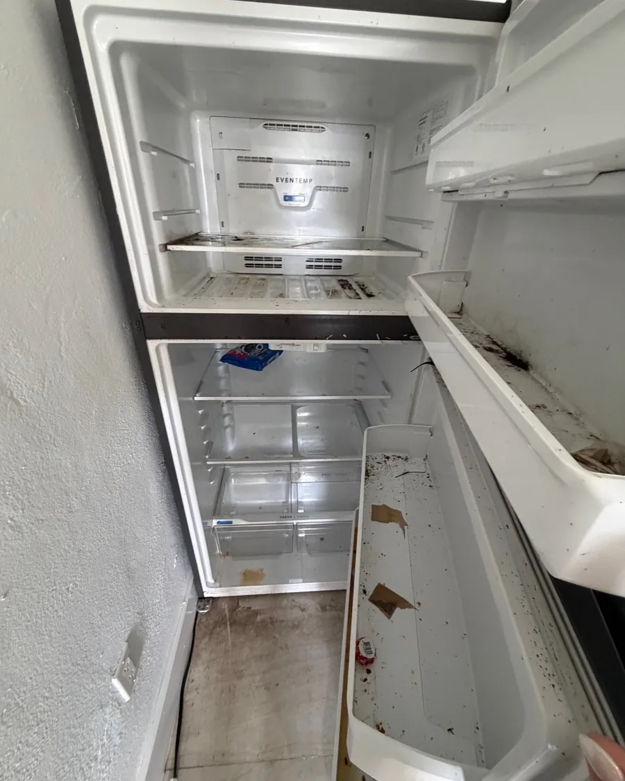 Fridge before a move-in clean